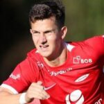 Hearts buy midfielder Kartum from Brann